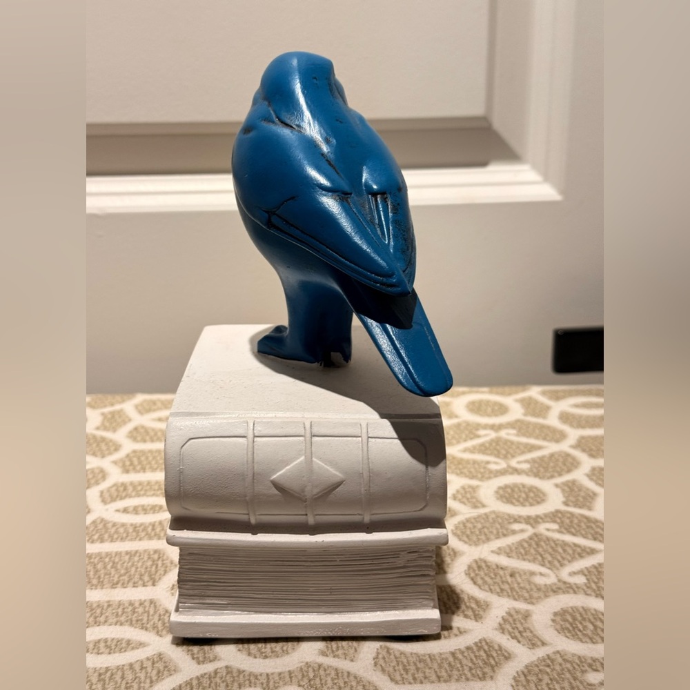 Blue bird figurine bookend on top of books - Picture 6 of 7